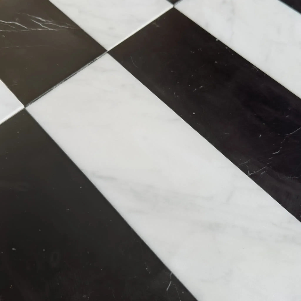 Black and white checkered pattern in Arezzo Carrara White and Nero Marquina 4X12 Set