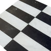 Black and white striped tiles in Arezzo Carrara White and Nero Marquina 4X12 Set
