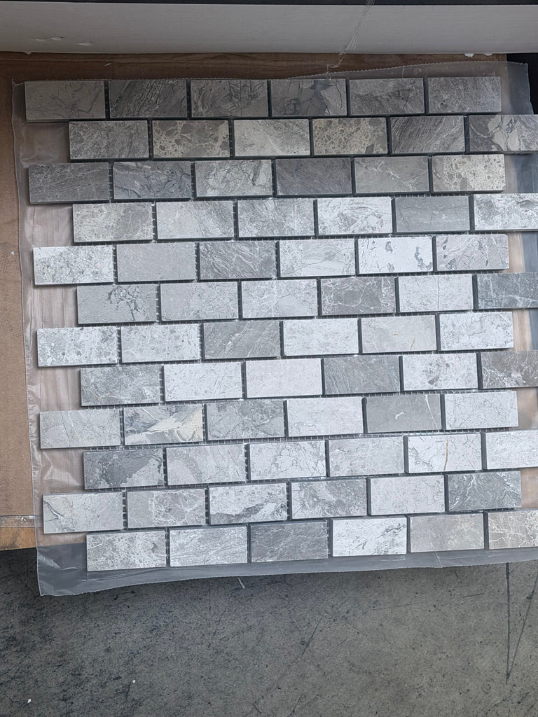 Atlantic Gray Marble 1x2 brick mosaic tile panel with gray veining