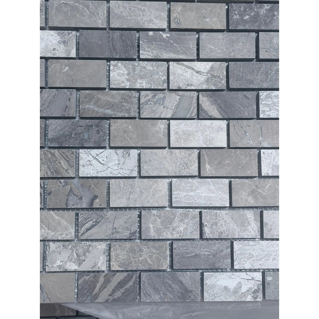 Gray marble-effect brick mosaic tile wall in Atlantic Gray Marble 1x2 polished or honed
