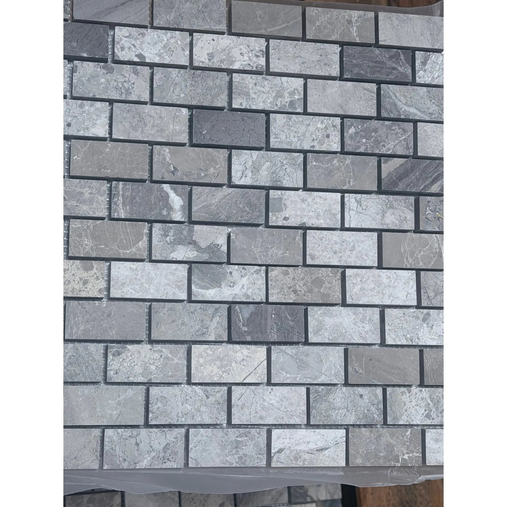 Atlantic Gray Marble 1x2 brick mosaic tiles in polished gray stone pattern