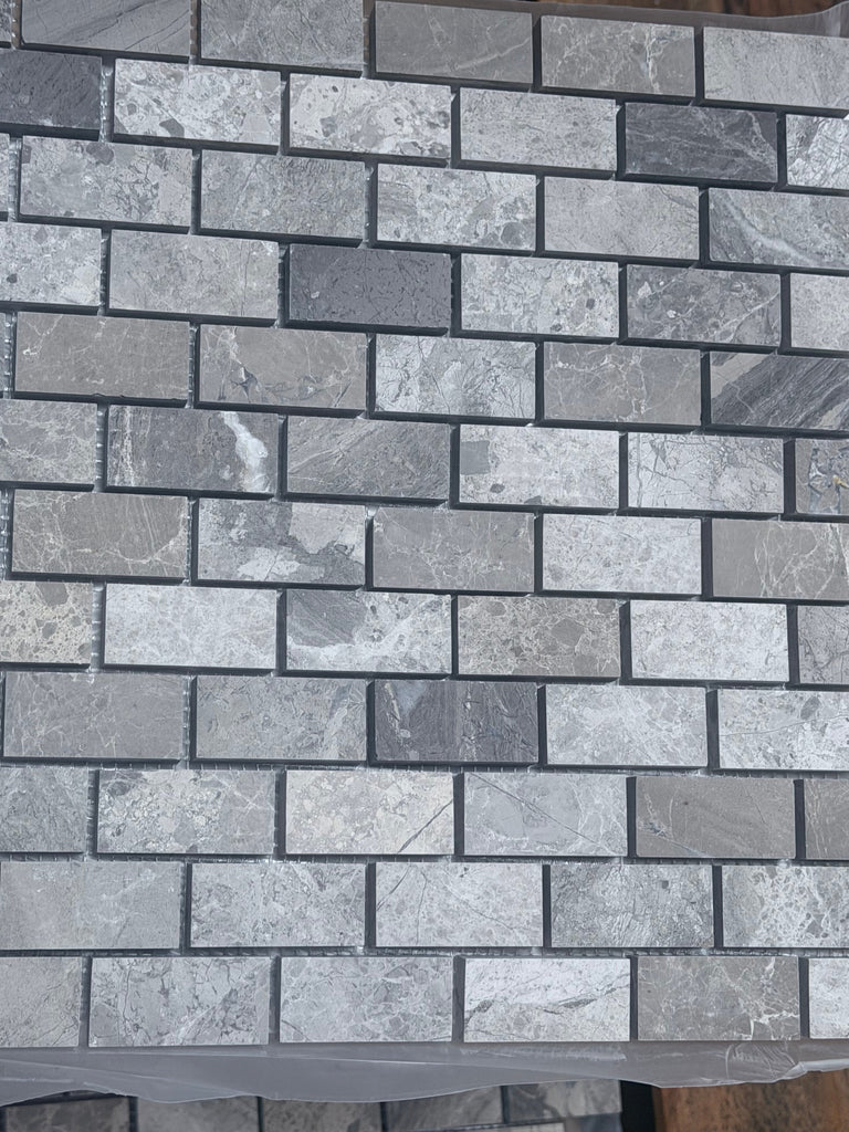 Atlantic Gray Marble 1x2 brick mosaic tiles in polished gray stone pattern
