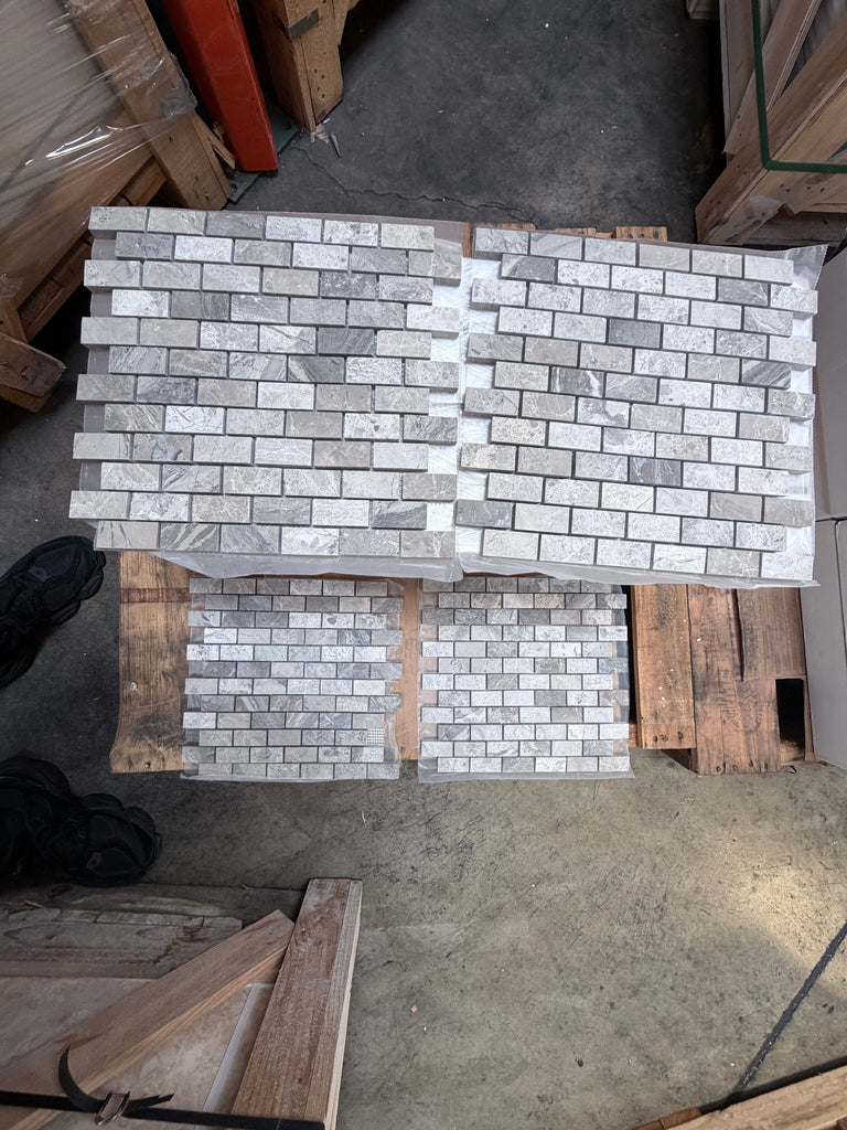 Gray and white Atlantic Gray Marble 1x2 brick mosaic tiles in polished or honed subway pattern