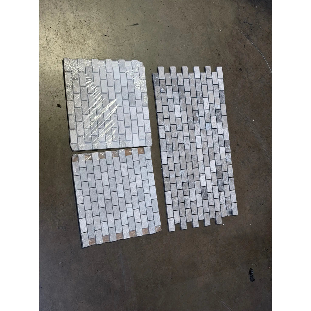 Atlantic Gray Marble 1x2 tumbled brick mosaic tiles in running bond pattern