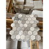 Hexagonal mosaic tile with a silver gray marble finish and subtle veining from Atlantic gray marble collection