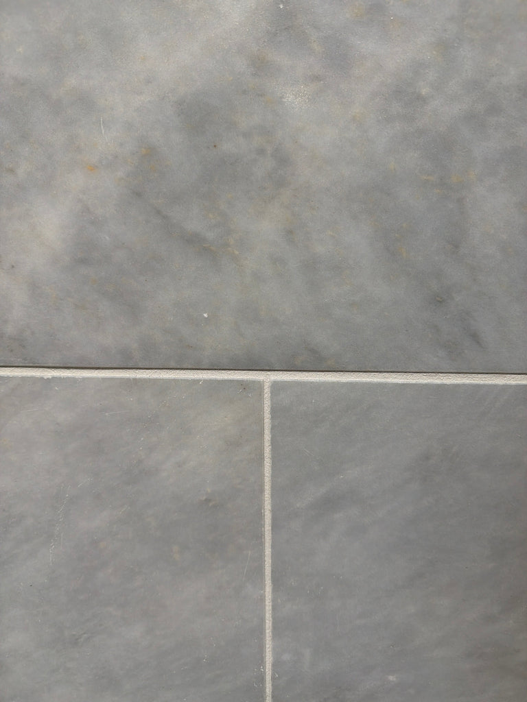 Azure Imperio 12x12 gray marble tile with subtle veining and light grout