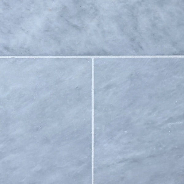 Light gray Azure Imperio 12x12 marble tile with subtle veining and polished finish