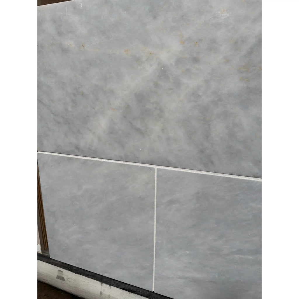 Azure Imperio 18x18 light gray marble tile with subtle veining and polished surface