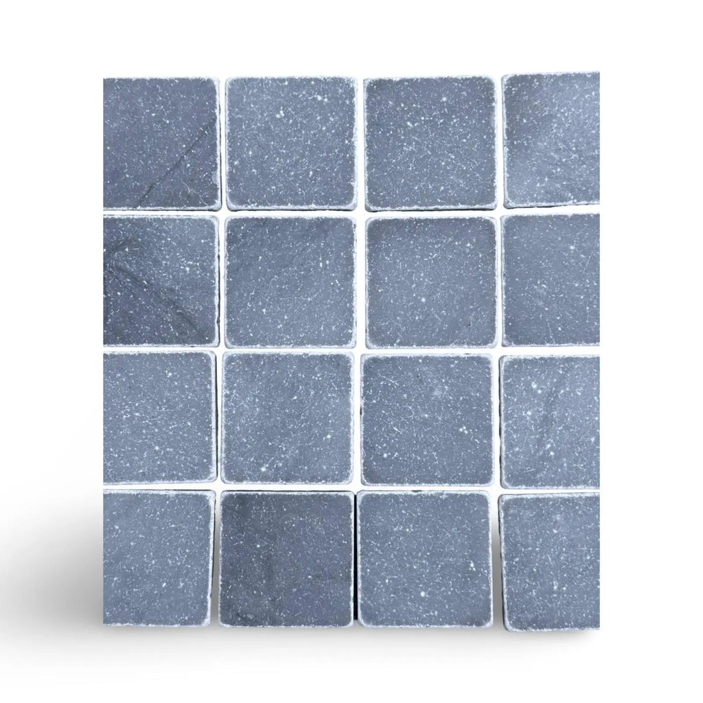 Square grid of Bardiglio 3X3 Tumbled dark gray stone tiles with white speckles and veining