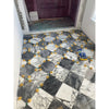 Marble tile floor with yellow spacers in Bardiglio Imperiale 12X12 Marble Tumbled