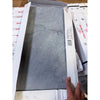A sleek gray bardiglio imperiale 12x24 marble tile with subtle veining and a polished finish
