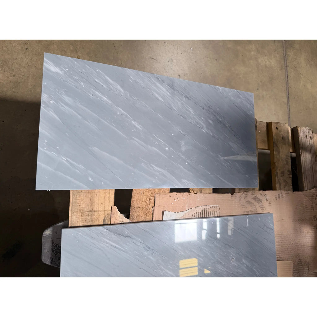 Bardiglio imperiale 12x24 marble slab with polished reflective surface in gray with subtle white veining