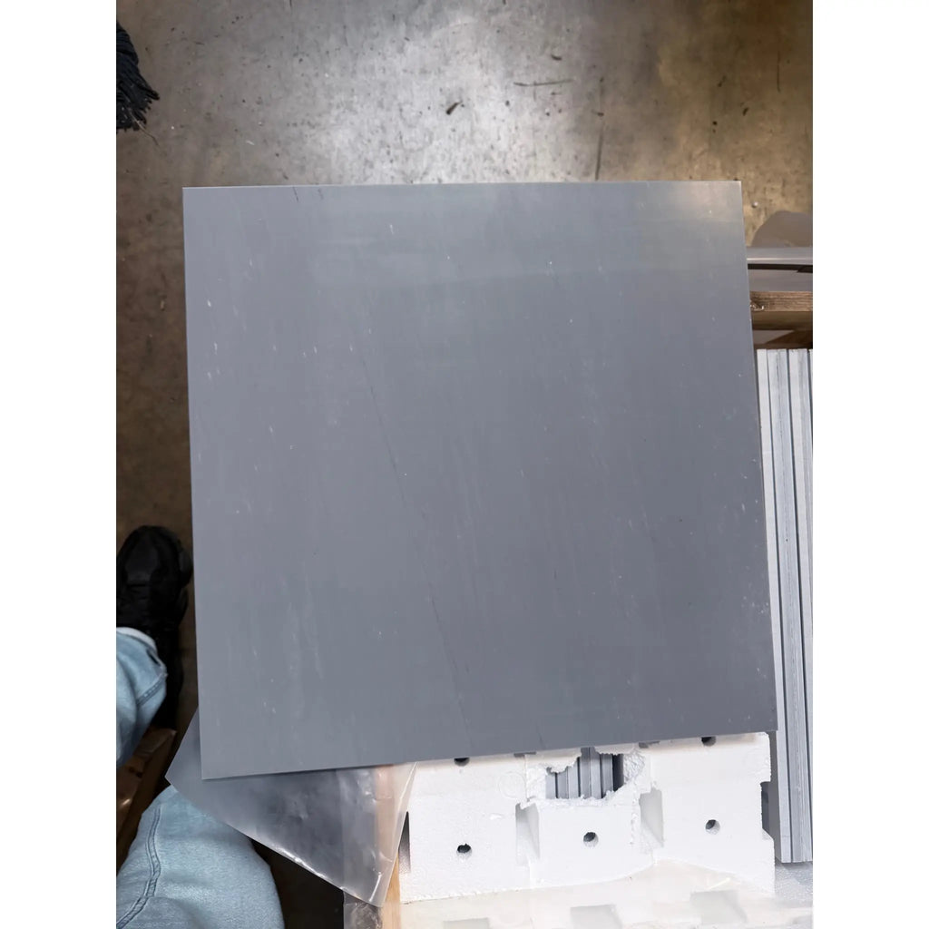 Gray Bardiglio Imperiale marble sheet on white foam blocks