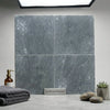 Four square 12x12 bardiglio imperiale gray marble tiles with tumbled finish arranged in a grid pattern