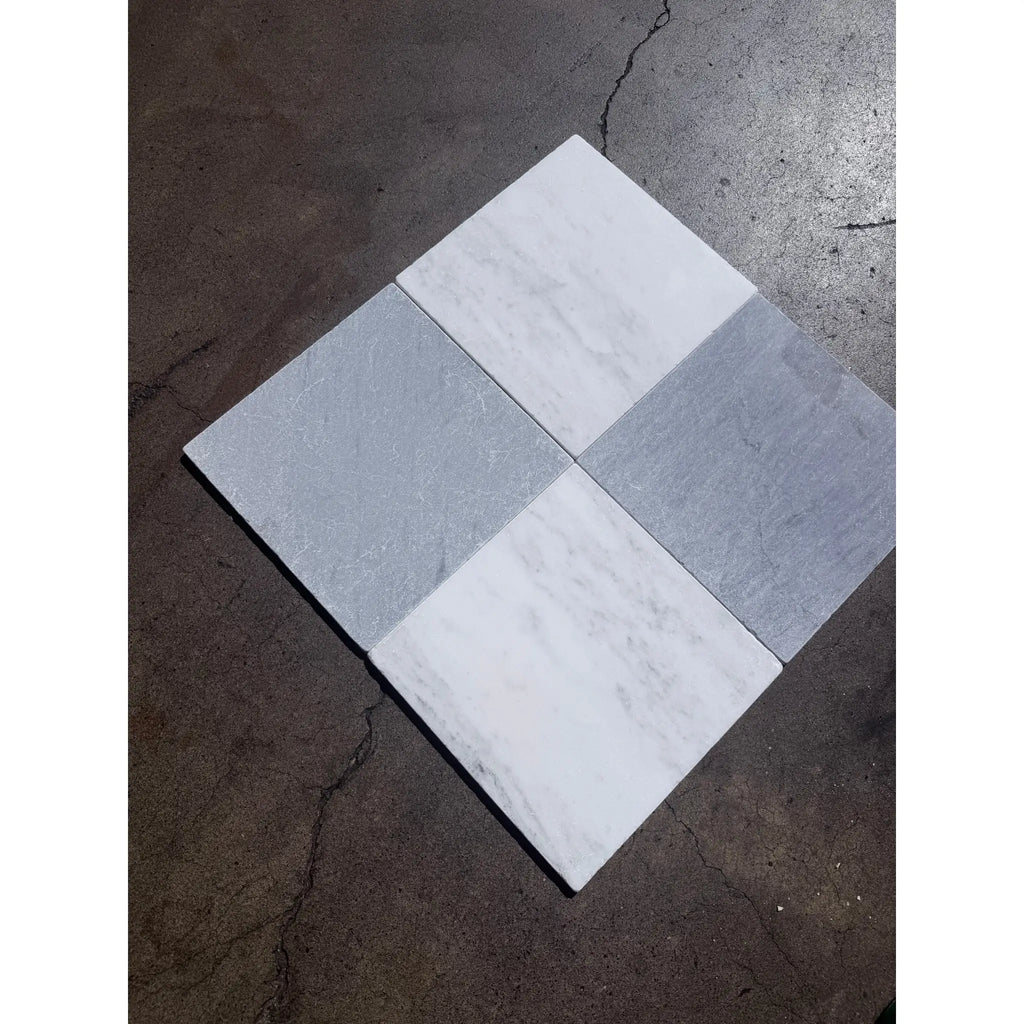 Four square bardiglio imperiale 12x12 marble tumbled tiles with white marble gray veining and solid light gray stone surfaces