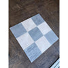 A square bardiglio imperiale 12x12 marble tumbled mosaic tile mat with a checkerboard pattern of light gray and white tiles