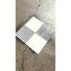 Bardiglio imperiale 12x12 marble tumbled tile with four-quadrant checkerboard pattern in white and gray marble-like surfaces