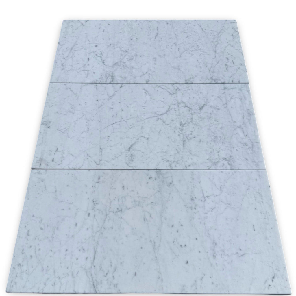 Marble-patterned floor tiles featuring Bardiglio Imperiale and White Carrara design