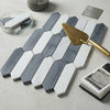 Gray and white marble hexagonal mosaic tile pattern featuring bardiglio imperiale and bianco dolomite marble tiles