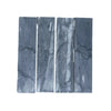Four gray Bardiglio Imperiale Marble 3’’ X 12’’ Field Tiles arranged elegantly