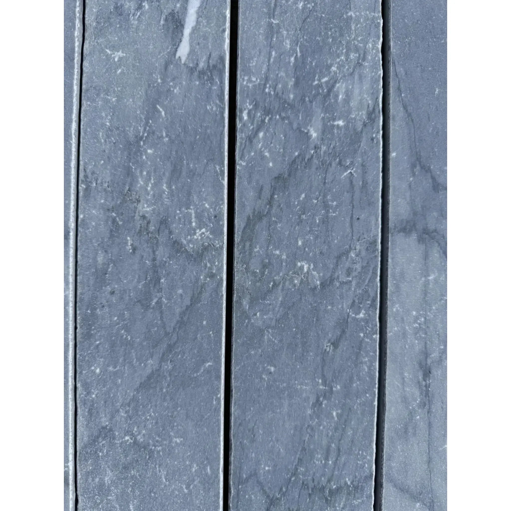 Gray Bardiglio Imperiale Marble slabs displayed as 3 x 12 field tiles