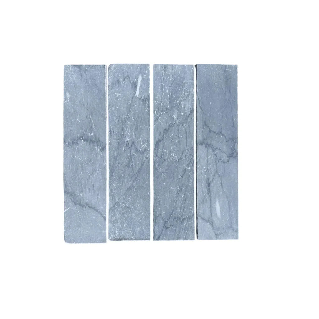 Rectangular gray Bardiglio Imperiale Marble 3’’ X 12’’ field tiles displayed elegantly