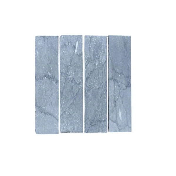 Rectangular gray Bardiglio Imperiale Marble 3’’ X 12’’ field tiles displayed elegantly