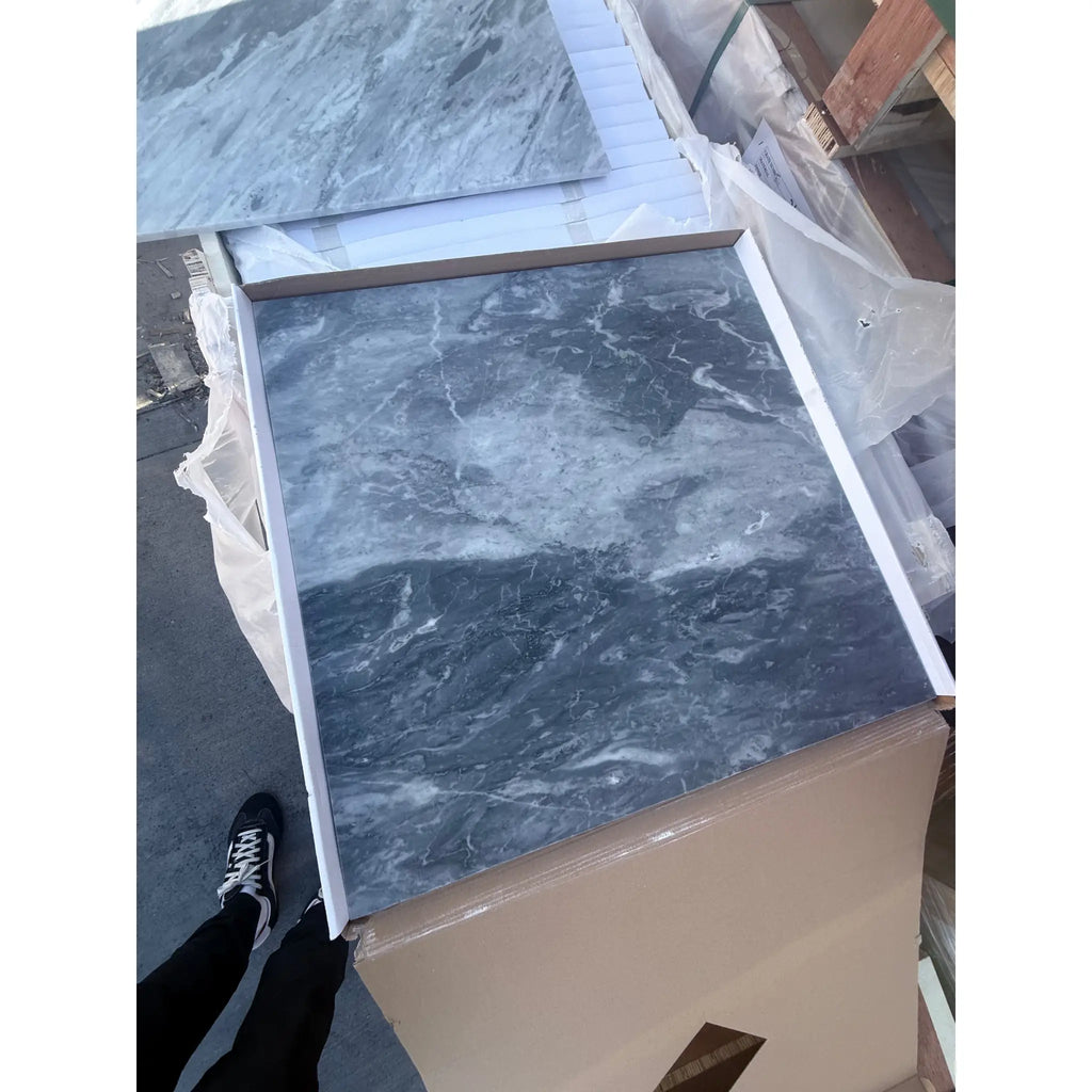Dark gray Bardiglio Nuvolato marble-look floor tile with white veining in 24x24 size