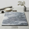 Polished gray and white bardiglio nuvolato marble tile with swirling veining by surfaces galore, 24x24 size