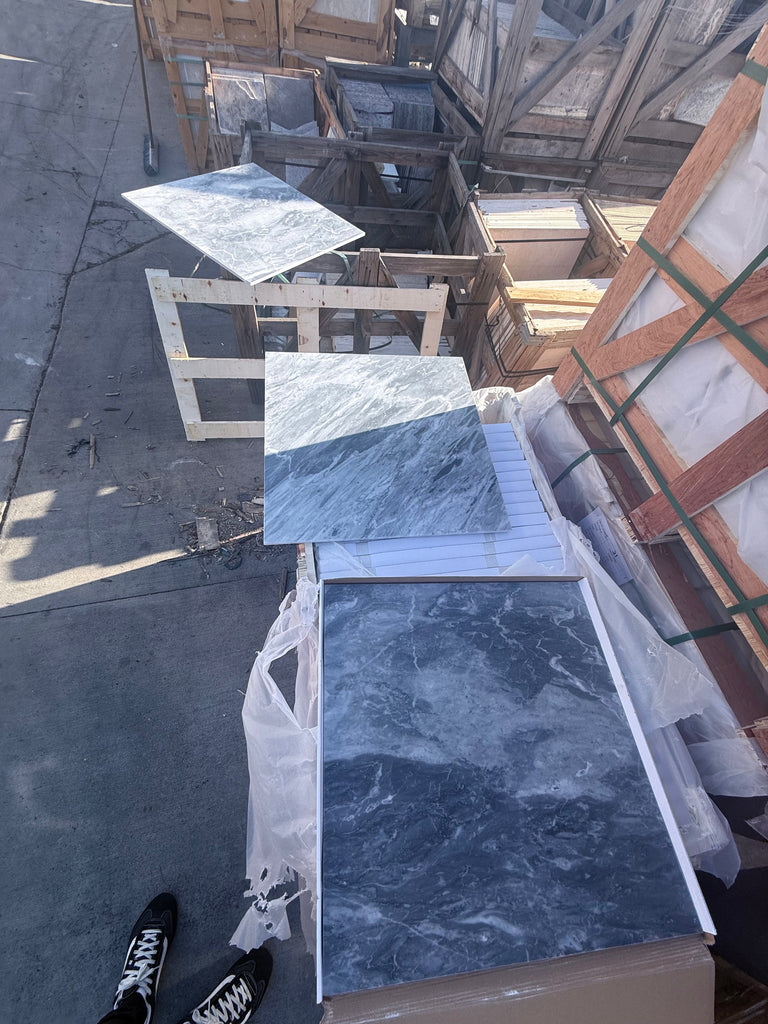 Blue and gray Bardiglio Nuvolato marble tiles with white veining in polished or honed finish