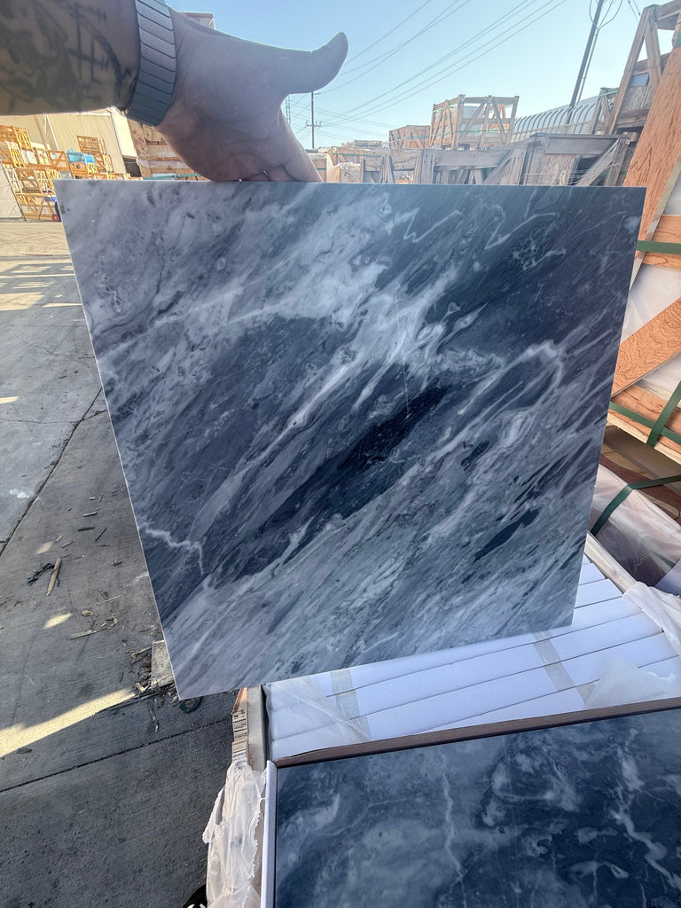 Square dark gray Bardiglio Nuvolato marble slab with prominent white veining