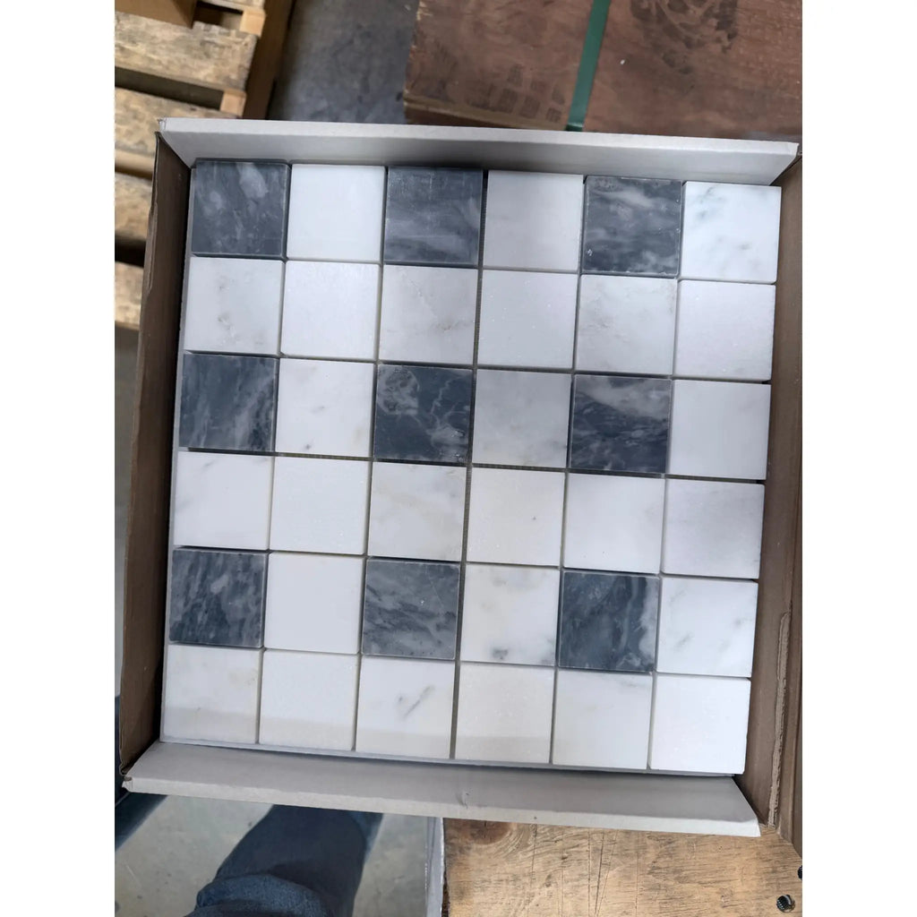 Square mosaic tiles in a checkerboard pattern featuring polished bardiglio nuvolato dark gray and thassos white marble