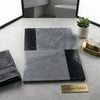 Set of modern gray and black marble bathroom tiles in geometric pattern bari in bardiglio imperiale and nero marquina