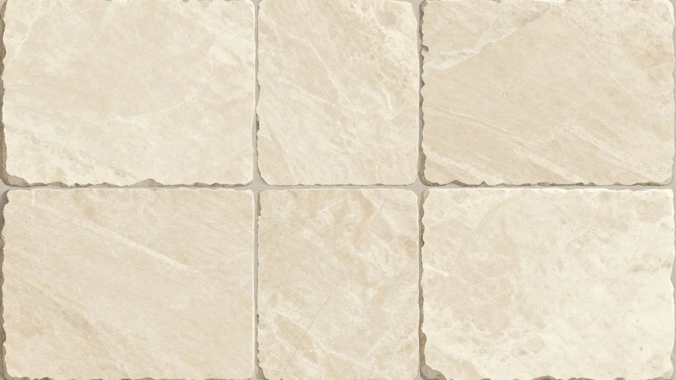 Light limestone tiles with natural veining and matte finish.