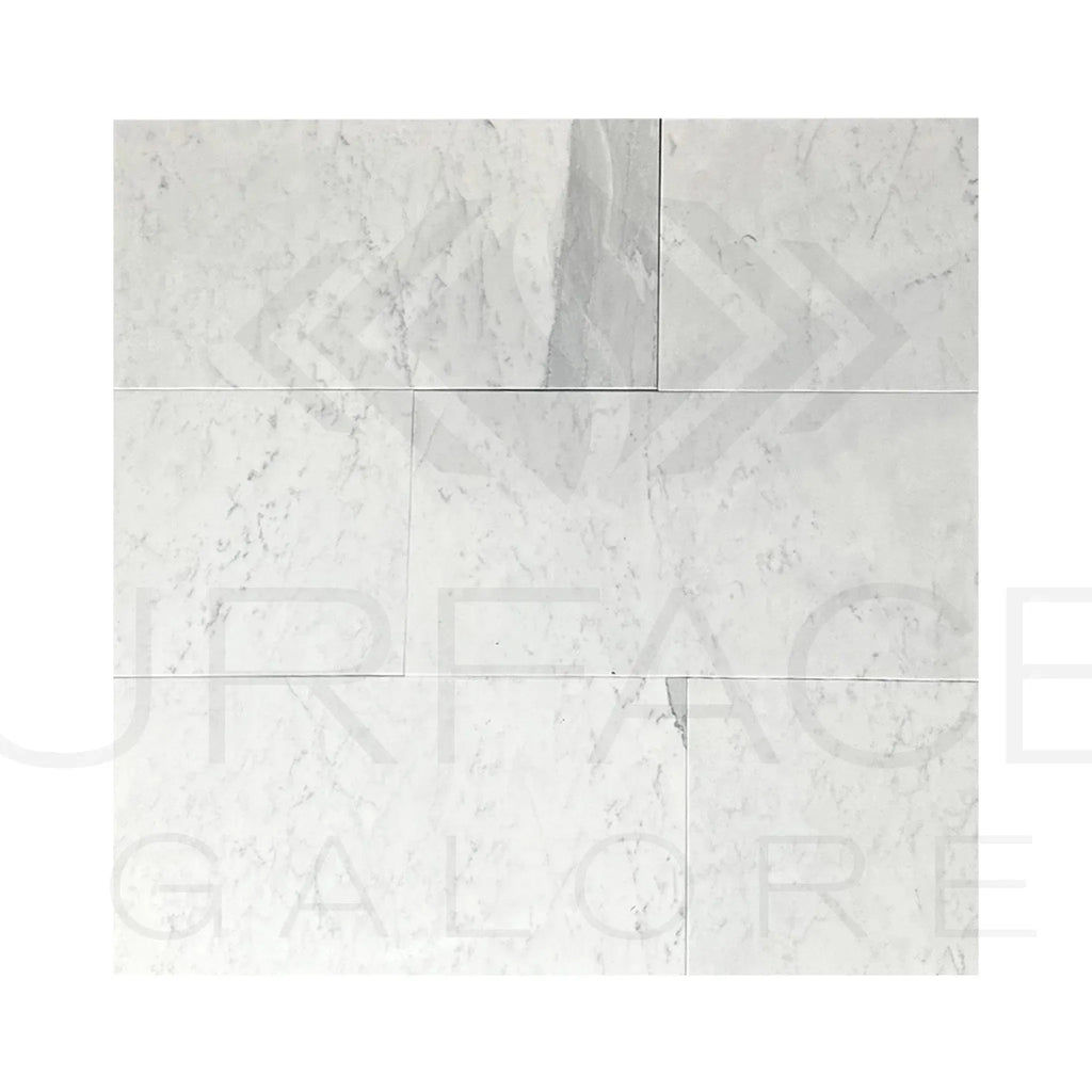 White marble tile arrangement of Bianco Carrara Standard 12X24 polished marble tile