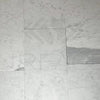 Bianco Carrara Standard 12X24 Polished Marble Tile featuring white marble floor tiles