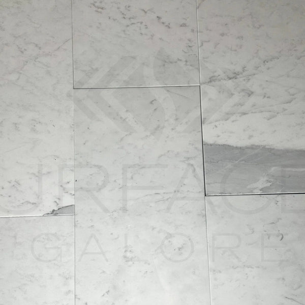 Bianco Carrara Standard 12X24 Polished Marble Tile featuring white marble floor tiles