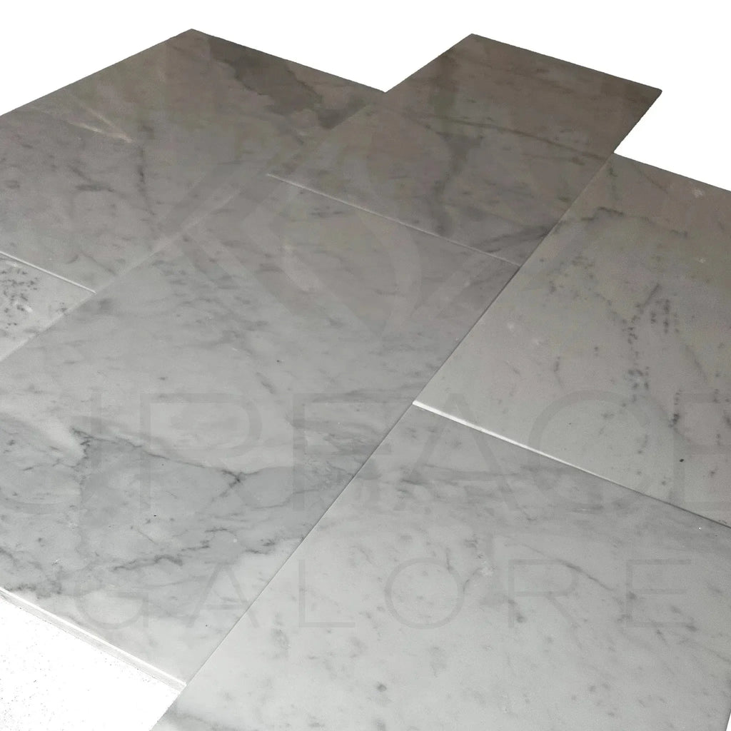 Bianco Carrara Standard 12X24 Polished Marble Tile display on marble floor tiles