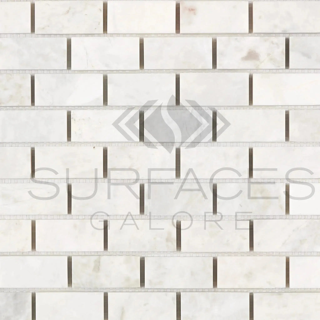 White marble brick mosaic tile in Bianco Congelato 1X2 Dolomite Leathered finish