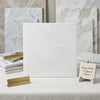A sleek white Turkish Bianco Dolomite marble slab with subtle veining and a polished 12x12 surface