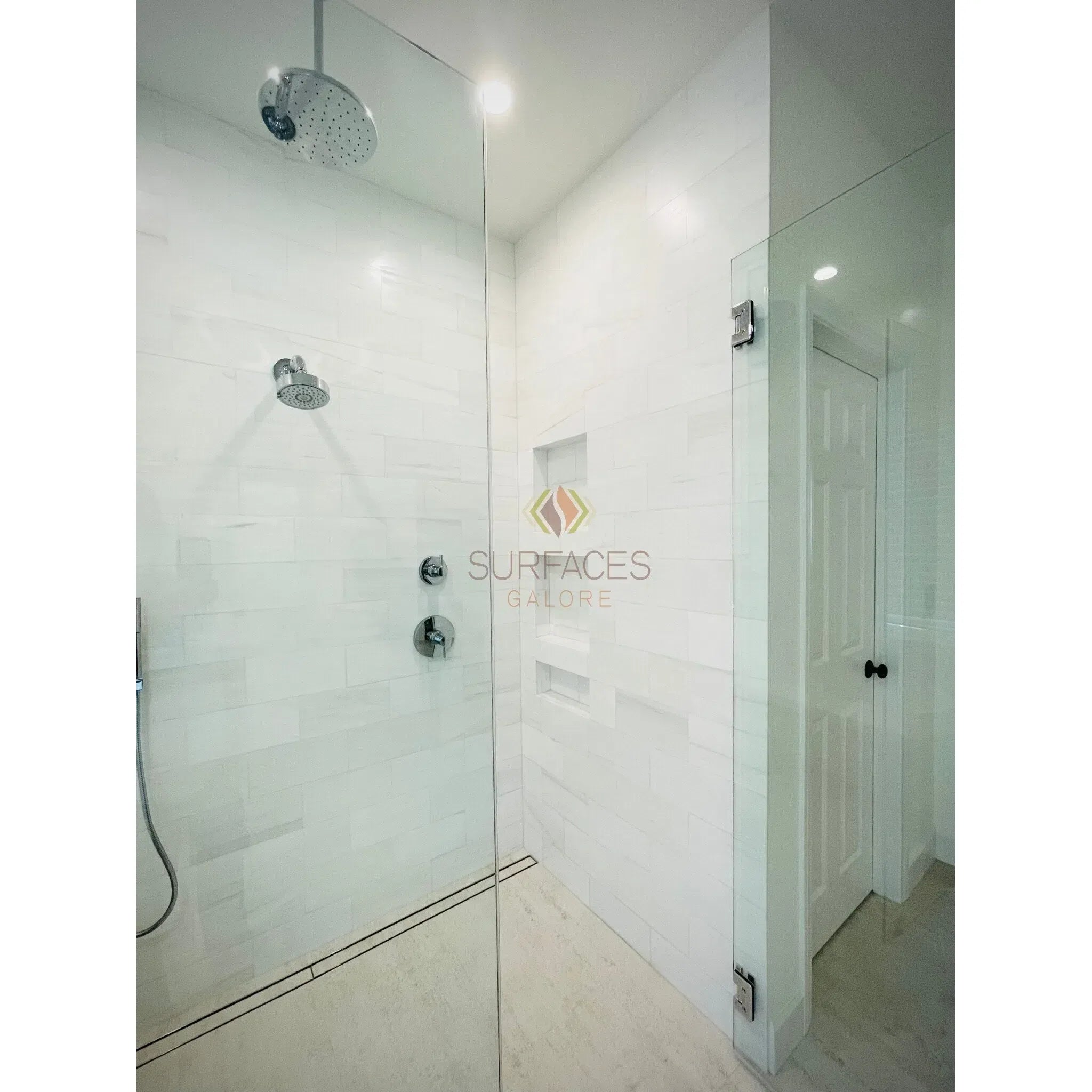 Modern white marble shower featuring Bianco Dolomite 12X24 polished or honed tiles