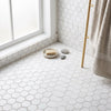 Bianco dolomite 2 inch hexagon mosaic marble floor tile in white with subtle gray grout lines polished or honed finish