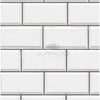 White beveled subway tile in Bianco Dolomite 2X4 brick polished-honed mosaic