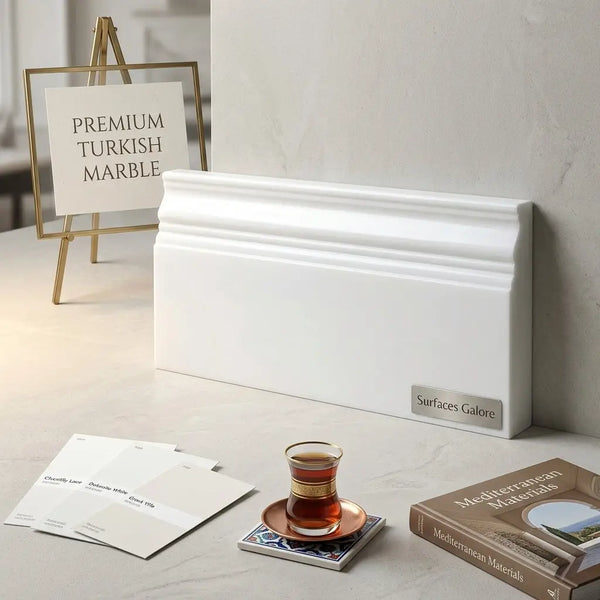 White turkish marble baseboard trim with elegant recessed molding in polished or honed bianco dolomite finish