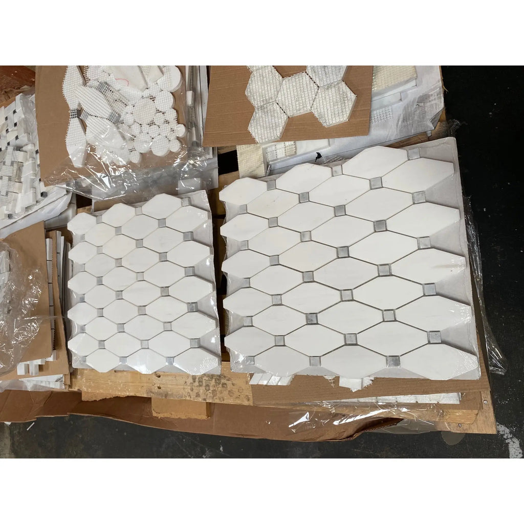 White dolomite octave long octagon mosaic tile panels with gray grout in polished or honed blue-gray marble
