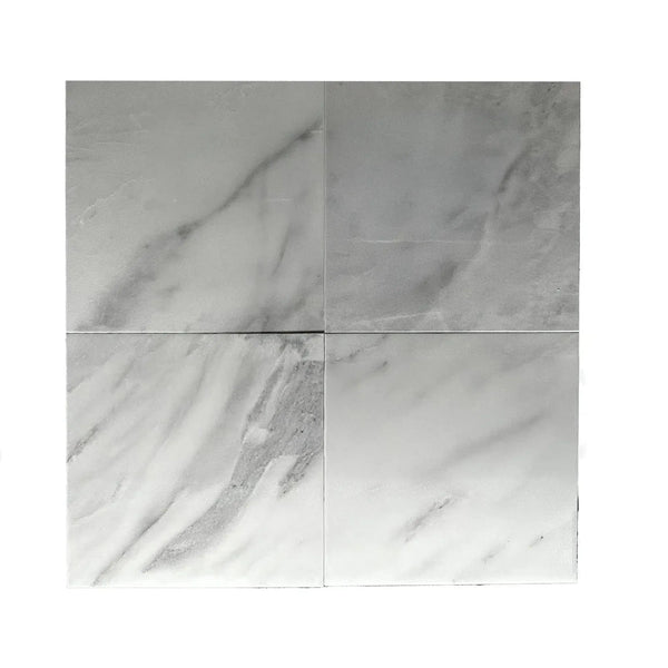 Four marble-patterned Bianco Venatino White Marble tiles displayed in a polished finish