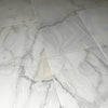 Bianco Venatino White Marble 12X24 Honed Tile showcasing elegant white marble flooring