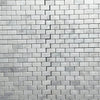 Cracked marble tile wall featuring Bianco Venatino White Marble Mosaic Tile