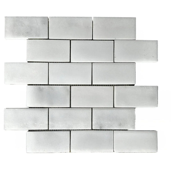 Bianco Venatino White Marble 2X4 Brick Honed Mosaic Tile in a white rectangular design