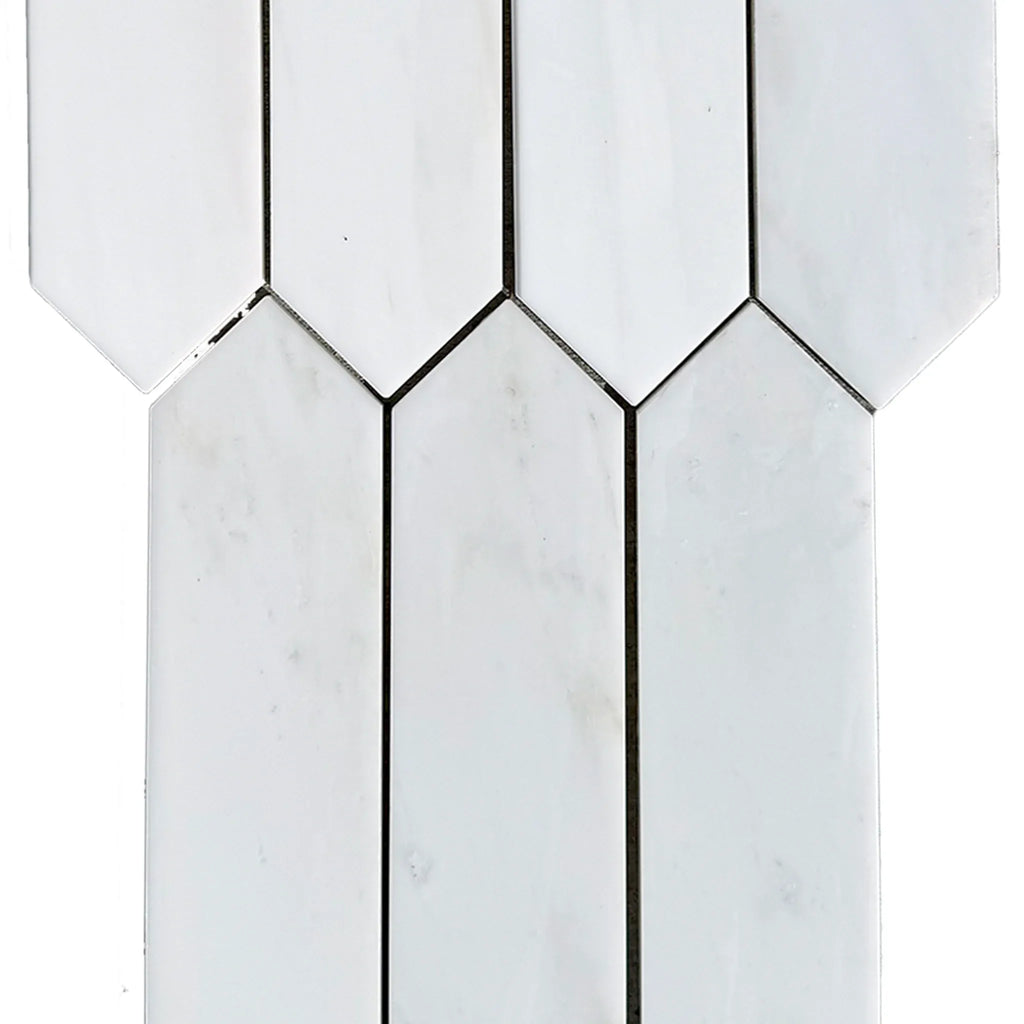 White elongated hexagon tiles featured in Bianco Dolomite Marble 3’’ X 12’’ Picket Mosaic